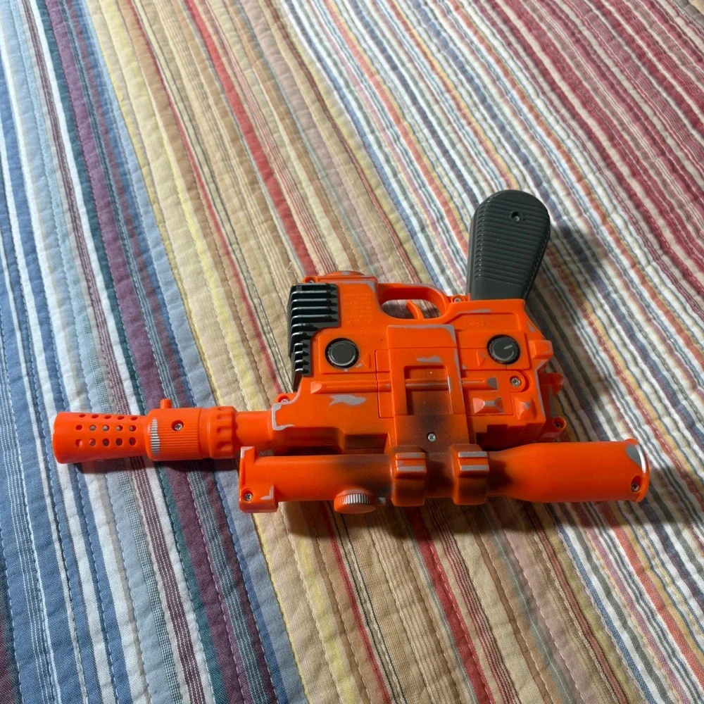 Disney Star Tours Star Wars Han Solo DL-44 Blaster Toy Orange Silver Weathered